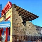 Archer City, Texas, Royal Theater, side view facade and roofless building behind